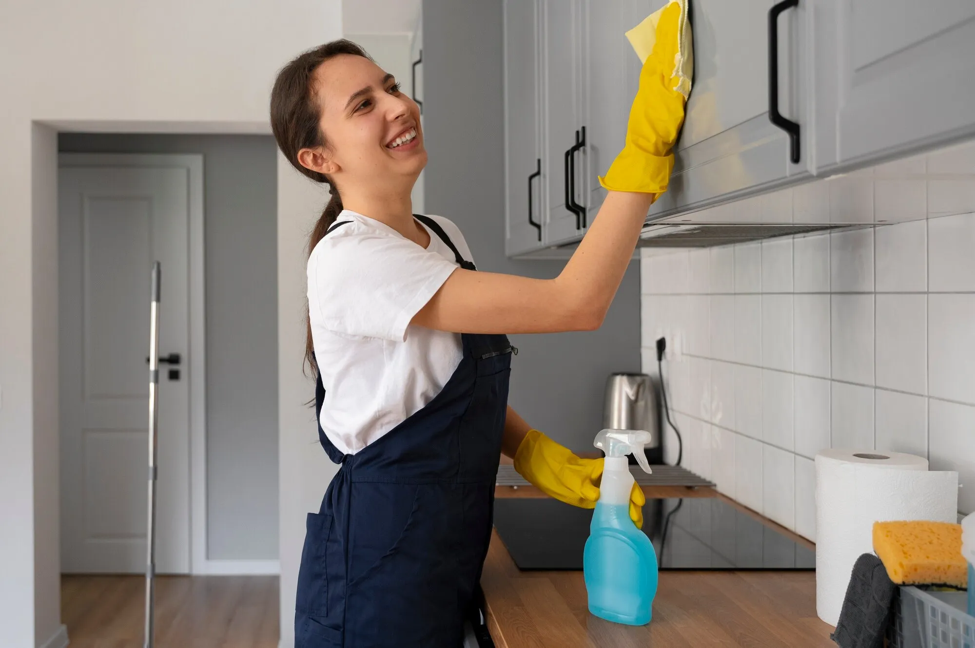 imgi 10 medium shot woman cleaning home 23 2150453304